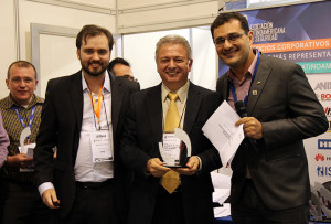 VP Group directors present the awards to Bonilha (center)